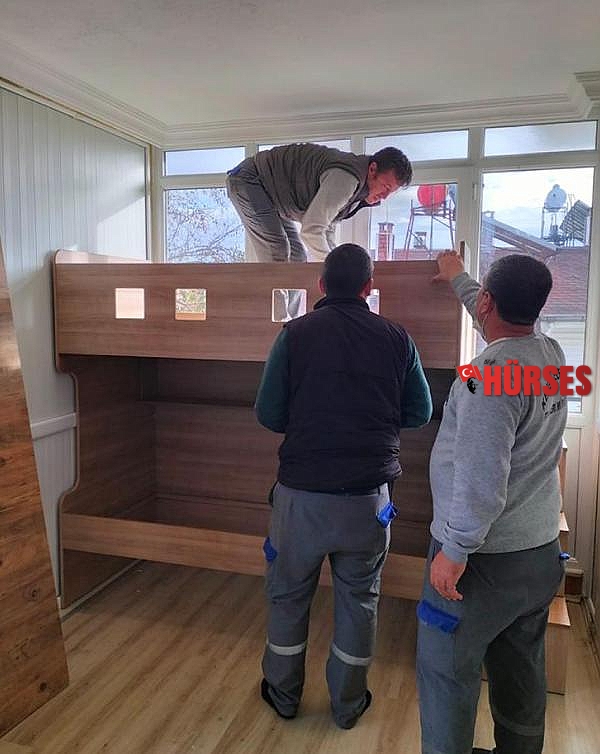 Kemer'de evleri yanan iki aileye eşya desteği