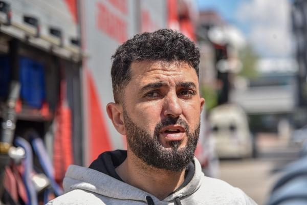 Yangın çıkan dairedeki 5 çocuğu dışarı çıkardı