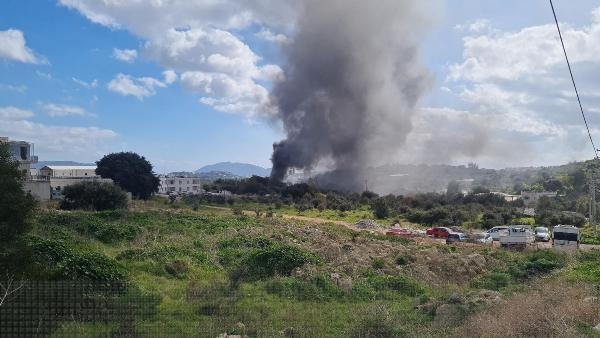 İş yerinde çıkan yangın, makiliğe sıçramadan söndürüldü