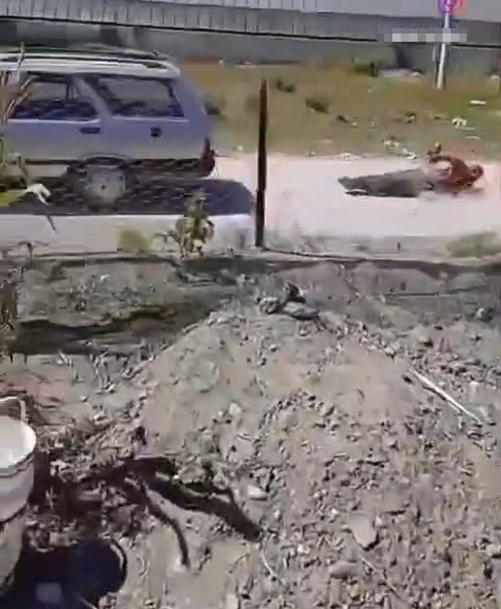 Köpek yüzünden tartıştığı kişiyi iple otomobilin arkasına bağlayıp sürükledi