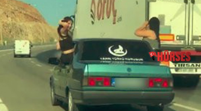 Otomobilin camından sarkan kadınların pes dedirten yolculuğu