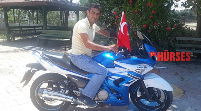 746 kilometre gidip şehitlikteki bayrakları yeniledi