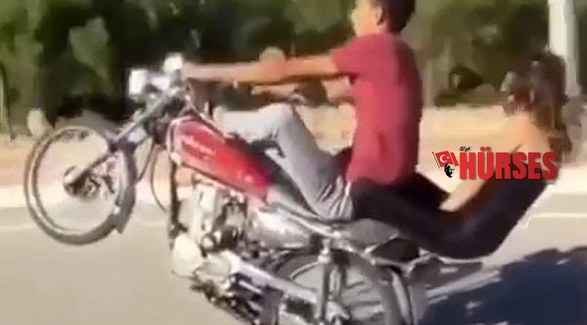 Motosikletle tek teker üzerinde tehlikeli yolculuk