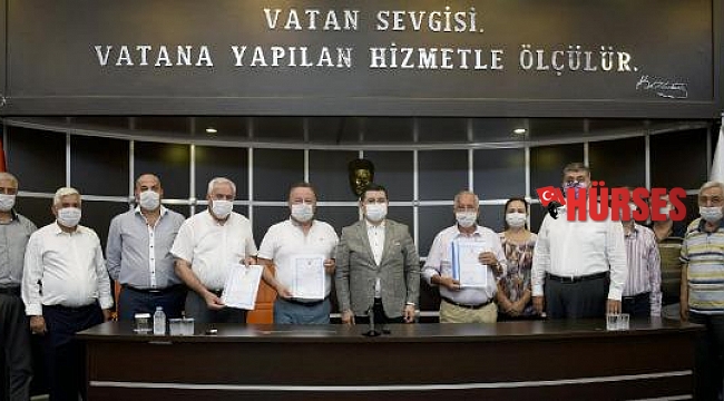Tütüncü'den inşaat malzemecileri esnafına tapu