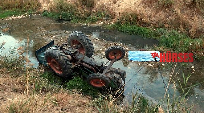 Çaya devrilen traktörün altında kalan sürücü öldü