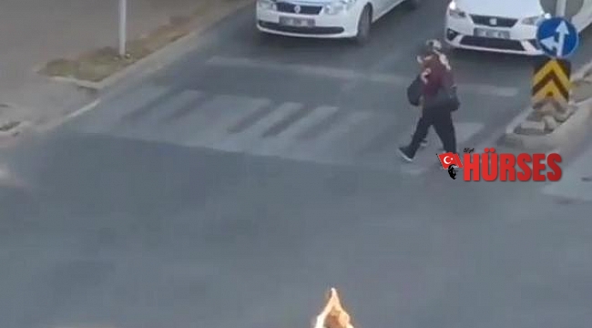 Cadde ortasına dizüstü oturdu