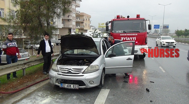 Hareket halindeki araç alev aldı, yardıma esnaf koştu