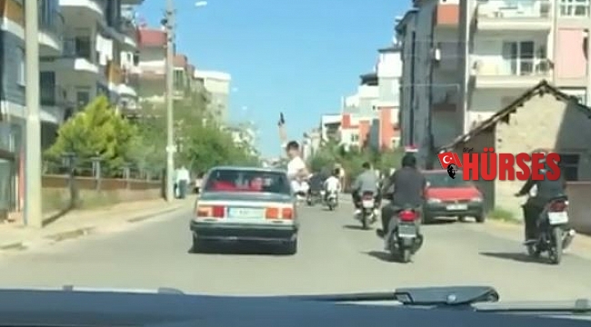 Asker uğurlama konvoyunda araçtan sarkıp, binaların arasında havaya ateş etti