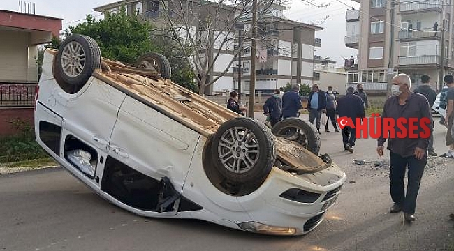 Takla atan araçtan burnu kanamadan kurtuldu
