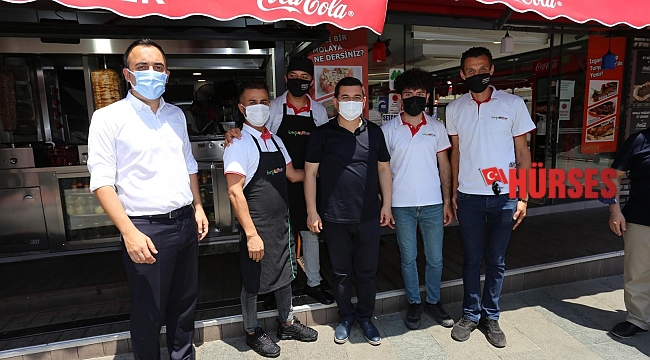Tütüncü, kapalı yol esnafıyla bir araya geldi
