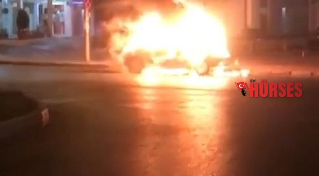 Yanan araca balkondan hortumla su