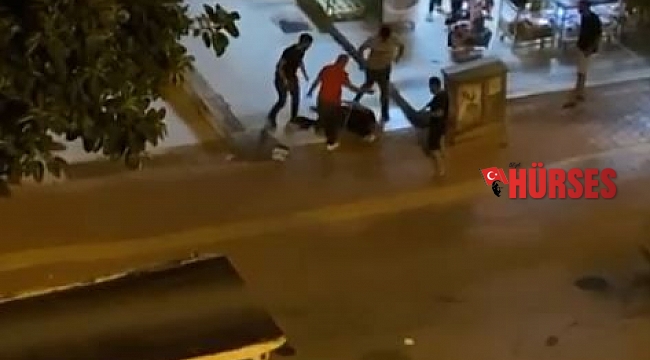 Taciz şüphelisini yere yatırıp tekme tokat dövdüler