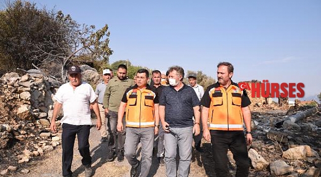 Tütüncü, afet bölgesini karış karış geziyor