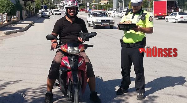 Kumluca'da jandarma ve polisten kask uygulaması