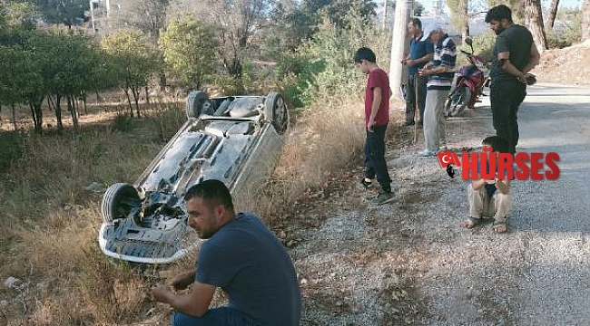 Takla atan araçtan burnu kanamadan çıktı