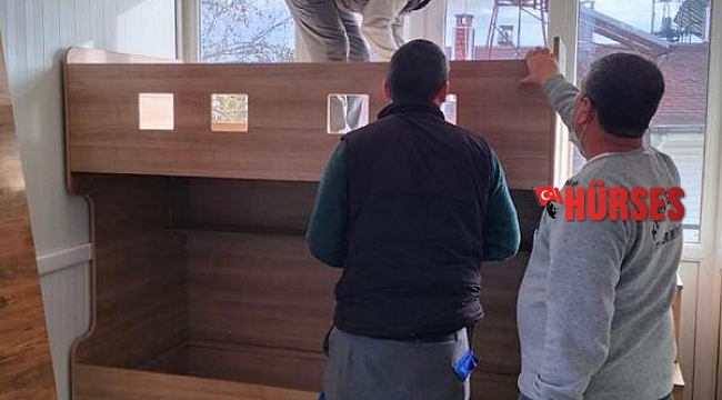 Kemer'de evleri yanan iki aileye eşya desteği
