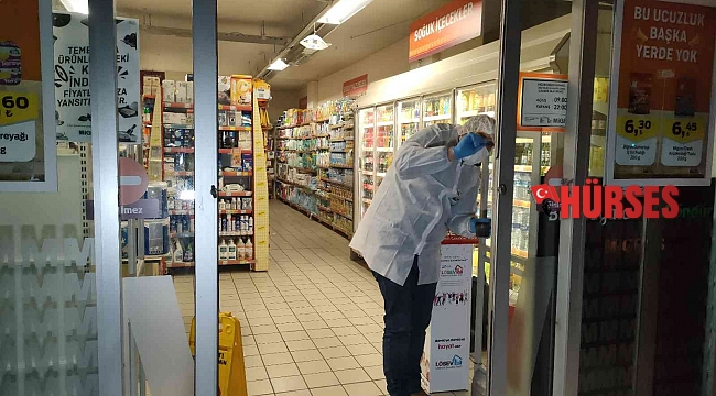 Antalya'da zincir market şubesinde cerrahi maskeli silahlı soygun