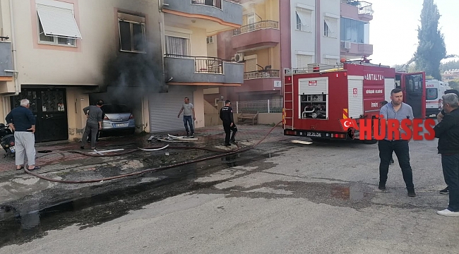 Bina altında kapalı garajda park halindeyken yanan araç paniğe sebep oldu