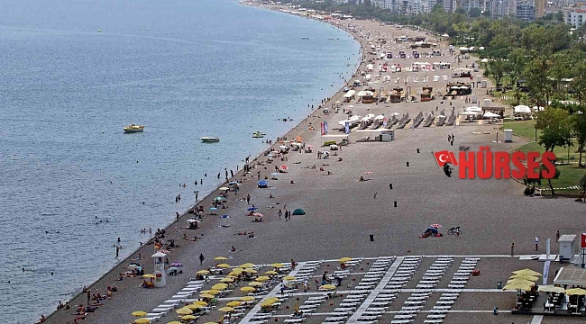 Antalya'da termometreler 36 dereceyi gösterdi, tatilciler sahillere akın etti
