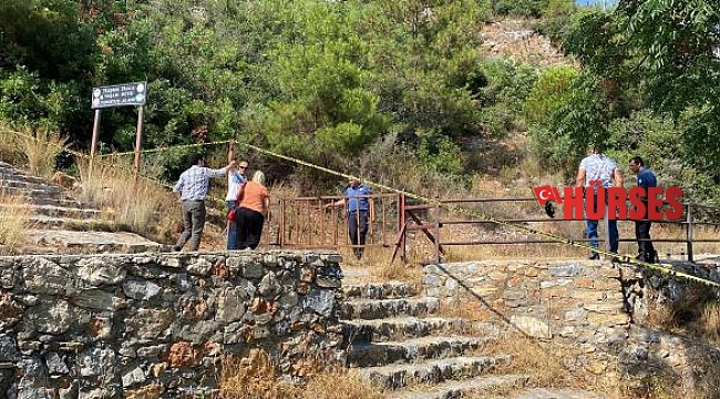 Kayıp emlakçıyı başına keserle vurup, halıya sardıktan sonra gömmüş