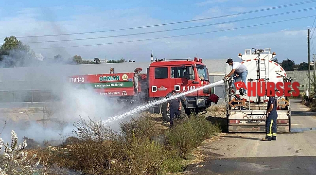 Antalya'da çalılık alandaki yangın büyümeden söndürüldü