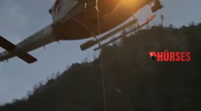 Yamaçta ayağı kırılan vatandaşa helikopterle nefes kesen kurtarma