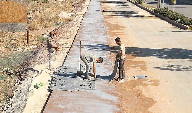 Döşemealtı'na renkli baskı beton kaldırım