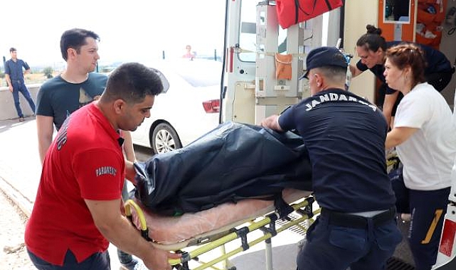 Serinlemek için girdiği denizde boğulmak üzereyken tekneyle kurtarıldı