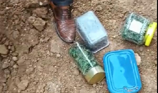 Kavga soruşturmasında, bahçeye kavanozla gömülmüş 1 kilo uyuşturucu ele geçirildi
