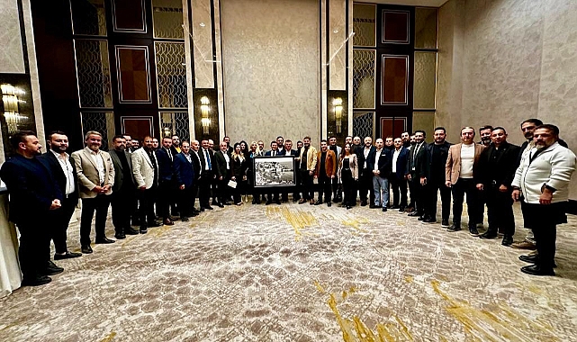 Tütüncü iş insanları ile birlikte