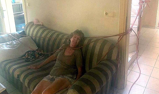Eşini boynundan ve ayaklarından bağlayıp, darbetti