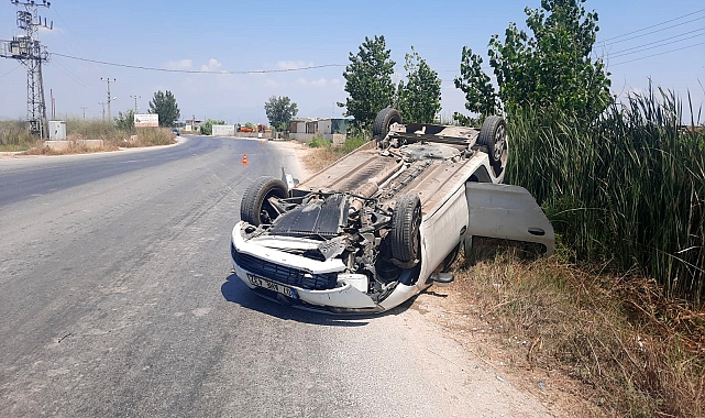 Takla atan otomobilde yaralanmadan kurtuldu