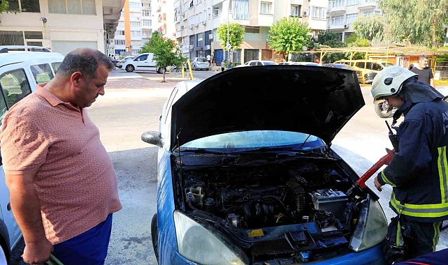 Aracının yanışını çaresiz gözlerle izledi
