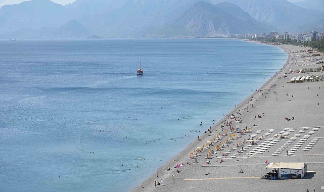 Antalya'nın sabahı kış, öğleni yaz oldu, tatilciler neye uğradığını şaşırdı