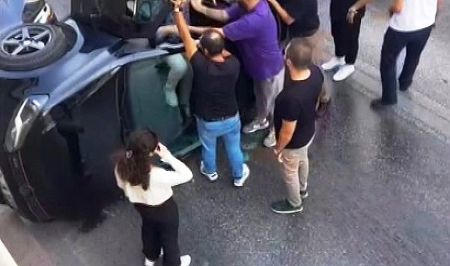 Takla atan otomobilden burnu kanamadan çıktı