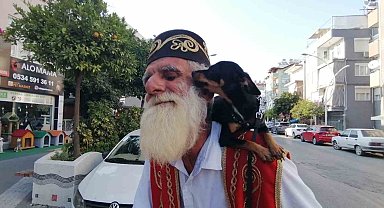 Yıllardır omuzundan indirmediği köpeğini indirdiğine pişman oldu