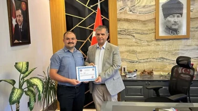 Hayat kurtaran veterinere kaymakamdan başarı belgesi