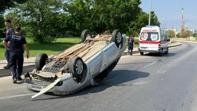 Takla atan otomobilden burunları kanamadan çıktılar