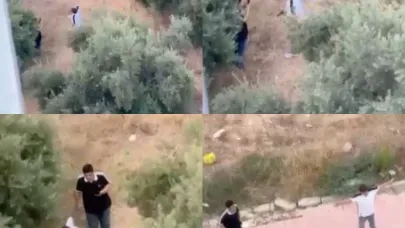 Çocukların tabanca ile tehlikeli oyunu kamerada