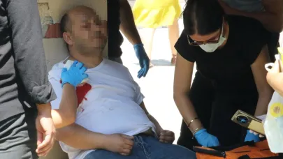 Eşiyle tartışıp, kendisini omzundan vurdu