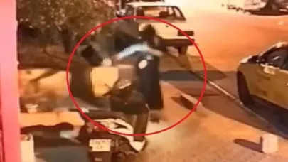 Patenle kayarak iş yeri kurşunladı: O anlar kamerada