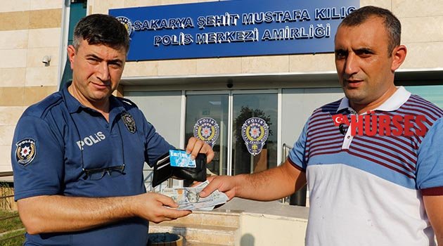 Cüzdan sahibi indirim kartından bulundu