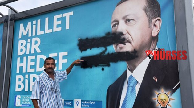 Erdoğan'ın afişine boyalı saldırı