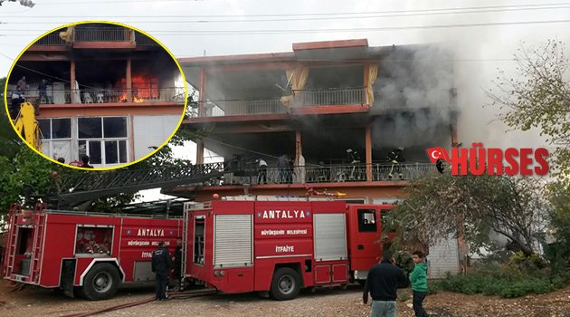 Ev yangınına iş makineli müdahale