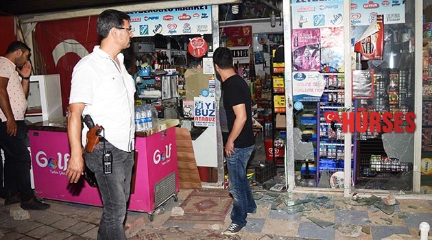 Markete taşlı sopalı saldırı