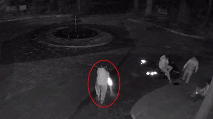 Mezarlıkta dubayı havuza fırlatıp kameraya el kol hareketi yaptılar