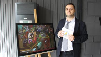 Antalya'da otizmli genç sanatçı eserlerini sergiledi